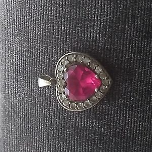 Pink stone and diamond heart charm set in 10k gold